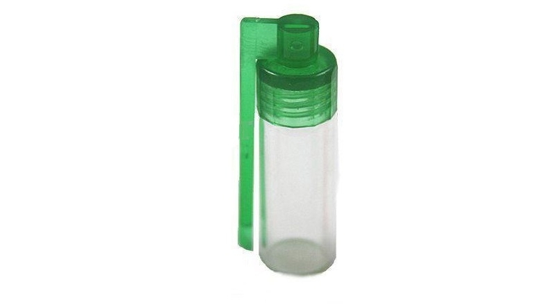 large snorting bottle with side spoon green